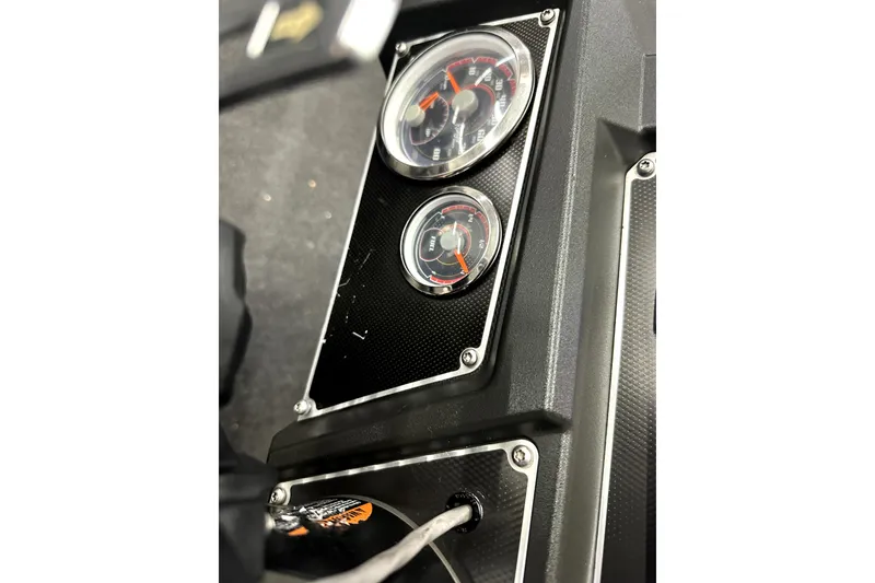Slide: The Image of Dashboard of 2022 Ranger Z521L boat with gauges and controls. - 44