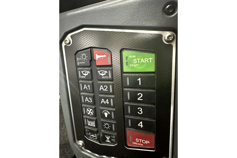 Slide: The Image of Control panel of 2022 Ranger Z521L boat with various buttons and indicators. - 60