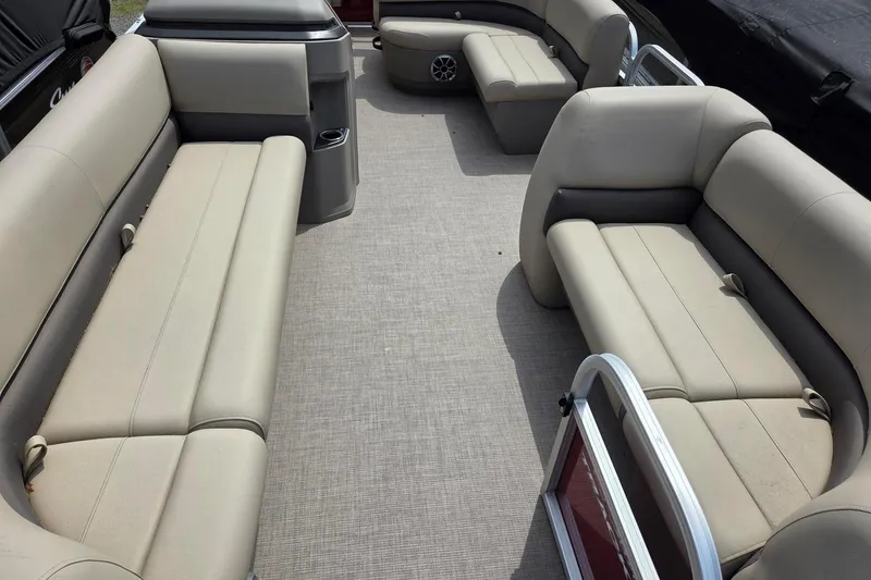 Slide: The Image of 2026 Sun Tracker Party Barge 18 DLX interior with spacious seating and modern design. - 6