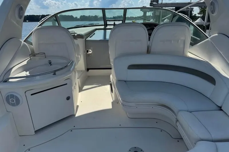 Slide: The Image of 2006 Sea Ray 340 Sundancer helm with dual seats and control panel. - 6