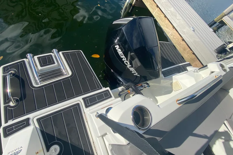 Slide: The Image of 2022 Beneteau Antares 8 with Mercury outboard engine at dockside. - 22