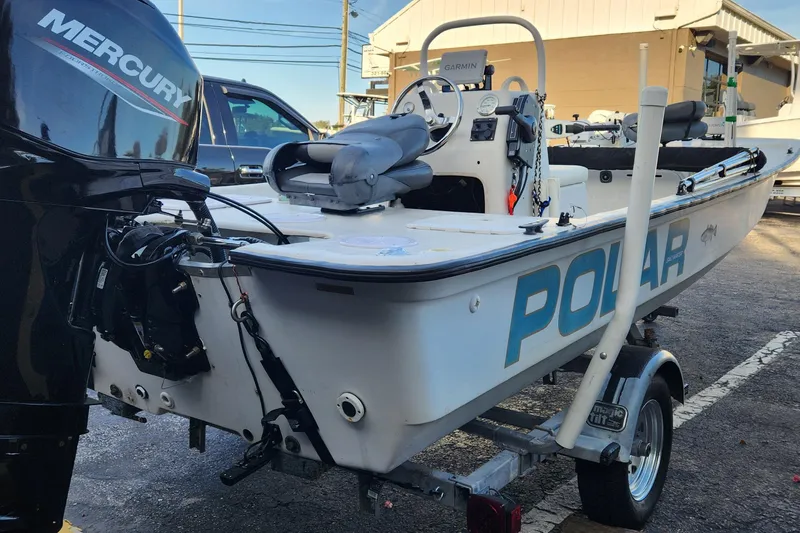 Slide: The Image of 1997 Polar 1700 Skiff boat on trailer with Mercury outboard motor. - 3