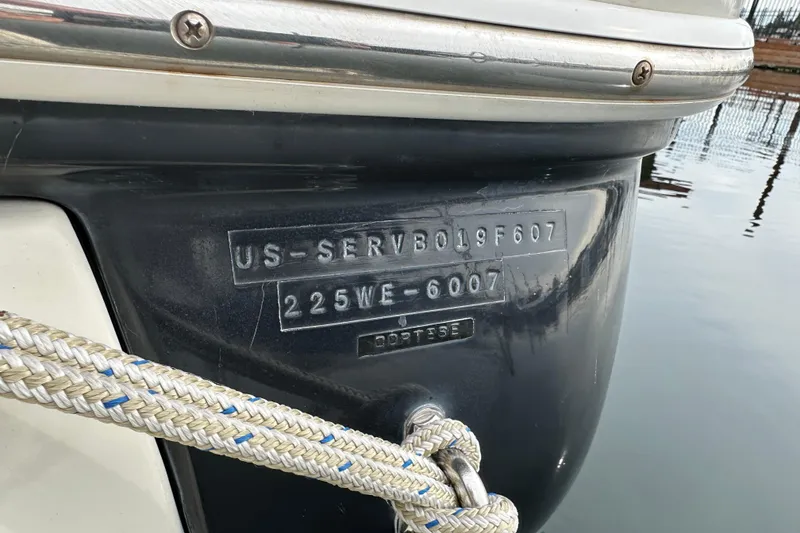 Slide: The Image of 2007 Sea Ray 225 Weekender boat hull identification number with rope detail. - 25