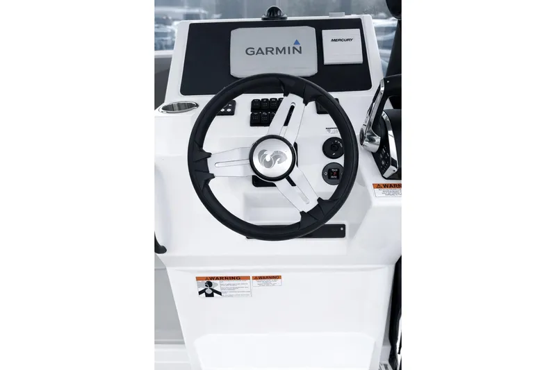 Slide: The Image of Steering console of 2024 Beneteau Flyer 8 SPACEdeck V2 with Garmin and Mercury displays. - 11