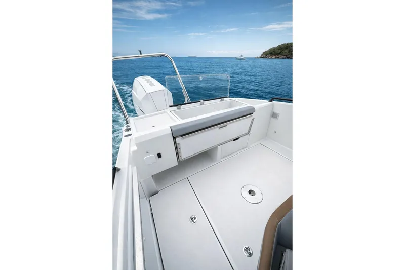 Slide: The Image of 2024 Beneteau Flyer 8 SPACEdeck V2 on calm blue sea, showcasing spacious deck design. - 14