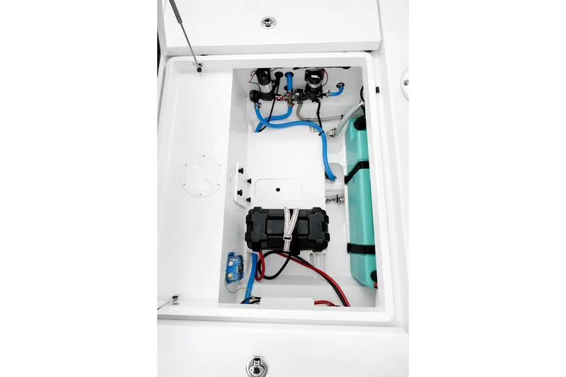 Slide: The Image of 2024 Beneteau Flyer 8 SPACEdeck V2 engine compartment with wiring and components. - 17