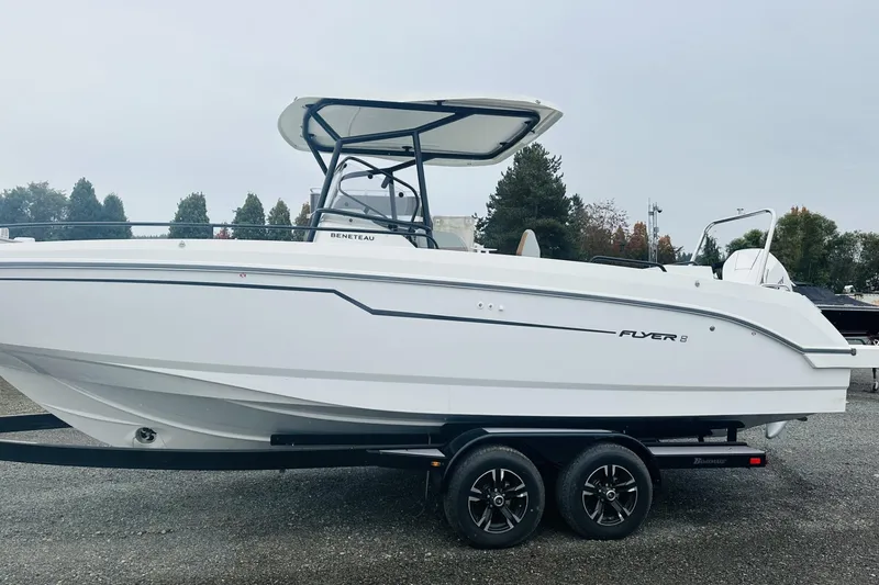 Slide: The Image of 2024 Beneteau Flyer 8 SPACEdeck V2 boat on trailer, side view. - 2