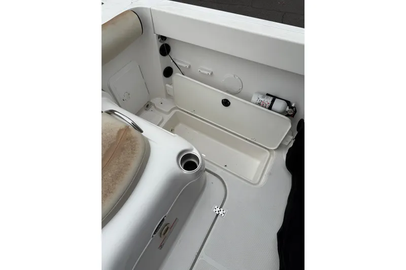 Slide: The Image of 2006 Campion Explorer 602i Sport Cabin interior with storage compartments and seating. - 10
