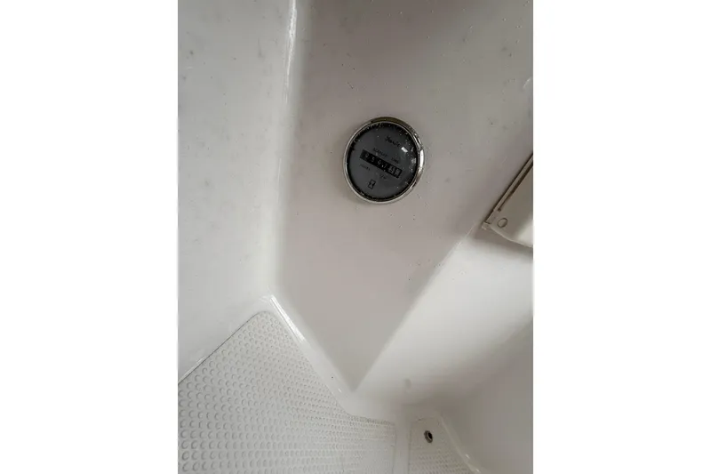 Slide: The Image of Close-up of a gauge in a 2006 Campion Explorer 602i Sport Cabin boat. - 13