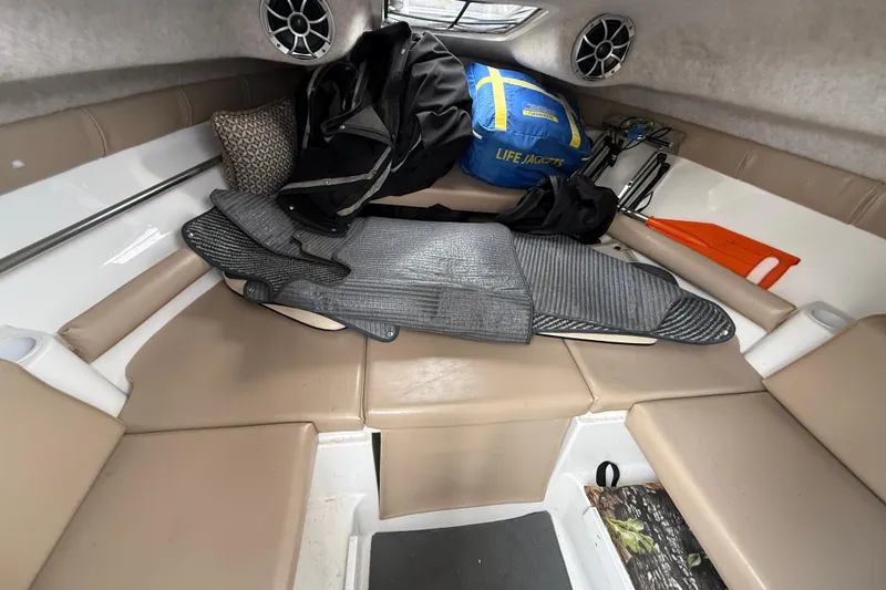 Slide: The Image of Interior of 2006 Campion Explorer 602i Sport Cabin with life jackets and gear. - 17