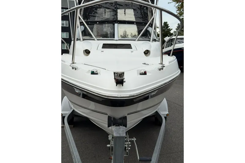 Slide: The Image of 2006 Campion Explorer 602i Sport Cabin boat on trailer, front view. - 19