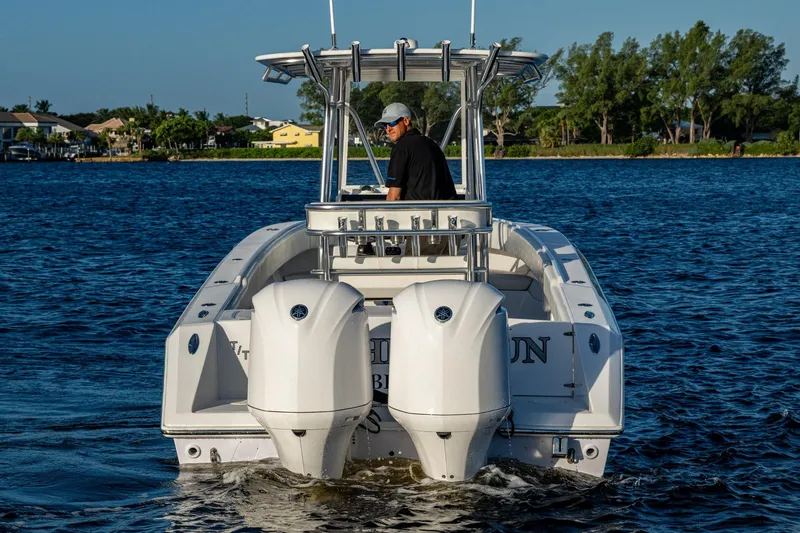 Slide: The Image of A 2005 Jupiter 27 boat cruising on a scenic waterway. - 39