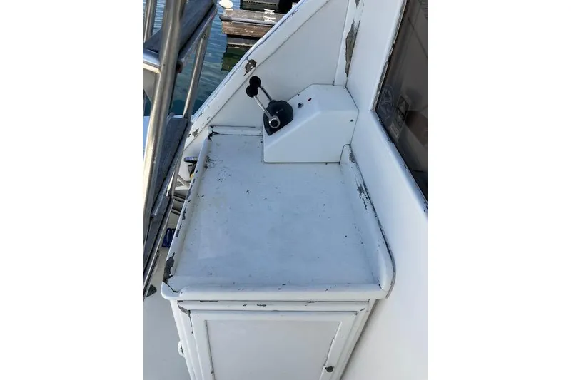 Slide: The Image of 1979 Pacemaker 40 Sportfisher control panel with lever, showing wear and age. - 38