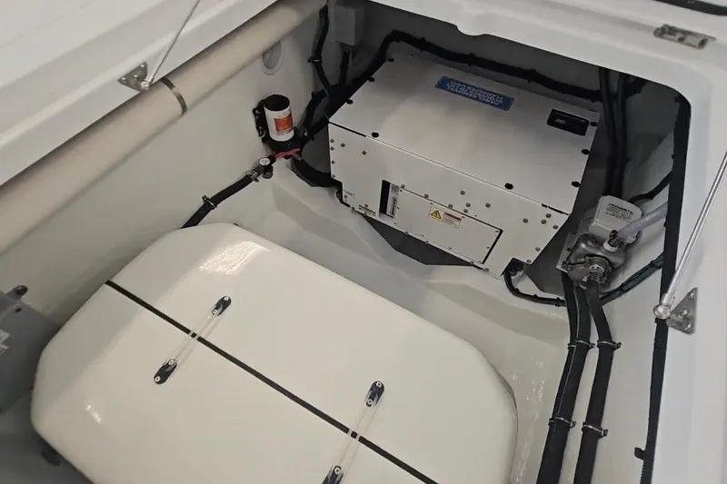 Slide: The Image of 2025 Intrepid 43 Nomad SE boat with snorkeling gear on deck, turquoise water background. - 16