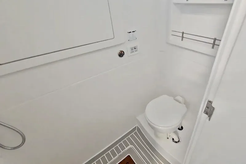 Slide: The Image of Interior of 2025 Intrepid 43 Nomad SE boat, featuring sleek design and modern controls. - 41