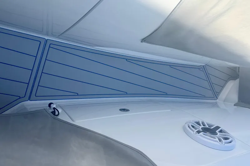 Slide: The Image of Deck of 2025 Intrepid 43 Nomad SE with sunlight and shadow patterns. - 51