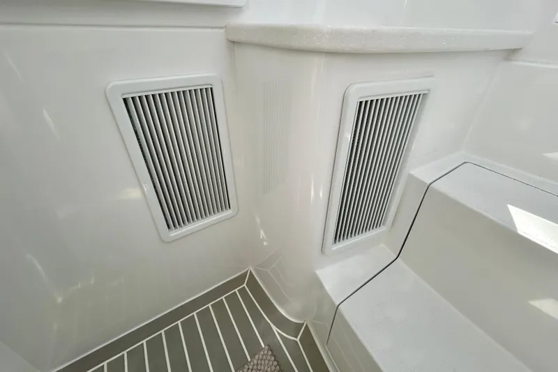 Slide: The Image of Interior view of 2025 Intrepid 43 Nomad SE boat with vented panels and steps. - 62