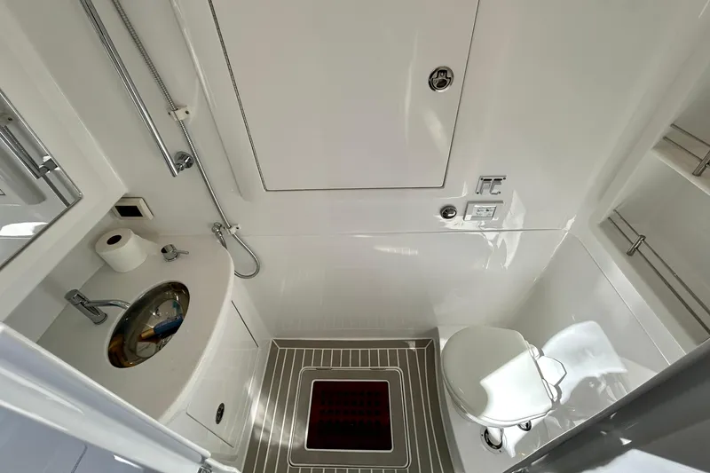 Slide: The Image of Luxurious bathroom in 2025 Intrepid 43 Nomad SE yacht, featuring modern fixtures and sleek design. - 65