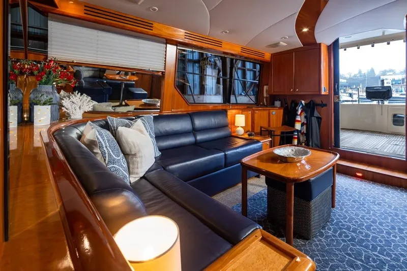 Slide: The Image of Luxurious interior of 2004 Mikelson 50 Sportfisher yacht with elegant seating and decor. - 8