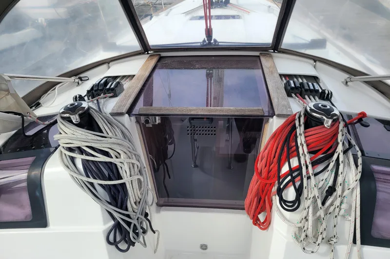 Slide: The Image of Cockpit of 2014 Jeanneau 379 sailboat with ropes and winches. - 21