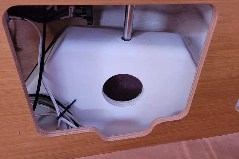 Slide: The Image of Interior view of 2014 Jeanneau 379 sailboat, showcasing wiring and structural components. - 70