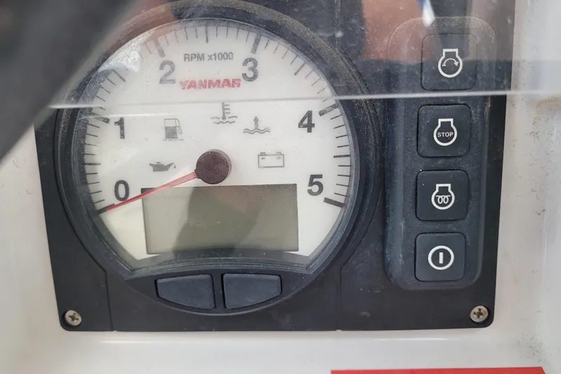 Slide: The Image of Close-up of Yanmar RPM gauge and controls on 2014 Jeanneau 379 sailboat. - 9