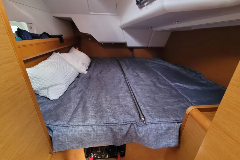Slide: The Image of Cozy cabin interior of 2014 Jeanneau 379 sailboat with comfortable bedding. - 42