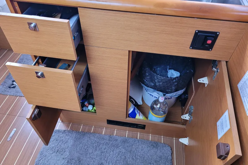Slide: The Image of Interior storage of 2014 Jeanneau 379 sailboat with open drawers and cabinet. - 60