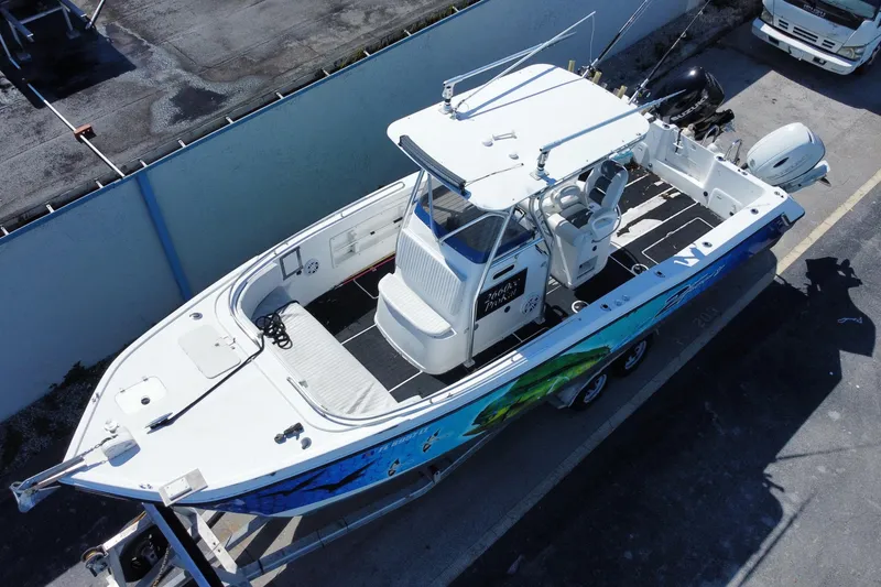 Slide: The Image of 2002 ProKat 2660 Center Console boat on trailer, aerial view. - 24