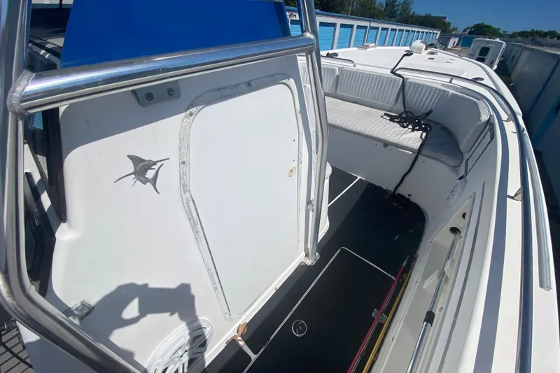 Slide: The Image of 2002 ProKat 2660 Center Console boat with spacious seating and sleek design. - 36