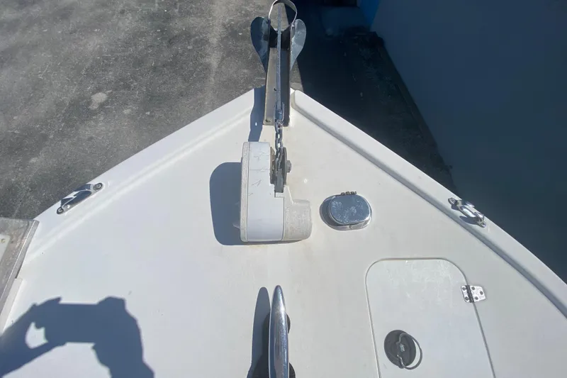 Slide: The Image of Bow of 2002 ProKat 2660 Center Console with anchor and hatch. - 44