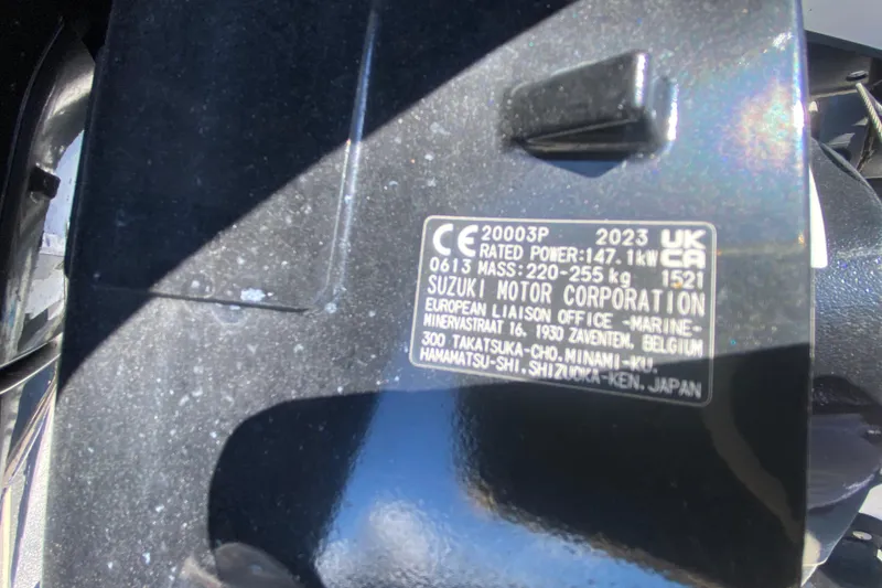 Slide: The Image of Label on Suzuki motor, 147.1 kW power, for ProKat 2660 Center Console, 2002 model. - 52