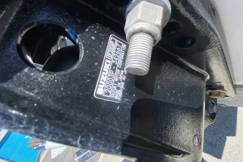Slide: The Image of Close-up of Suzuki DF200 motor part on 2002 ProKat 2660 Center Console boat. - 53