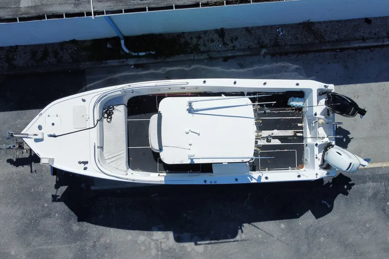 Slide: The Image of Aerial view of a 2002 ProKat 2660 Center Console boat on a trailer. - 64