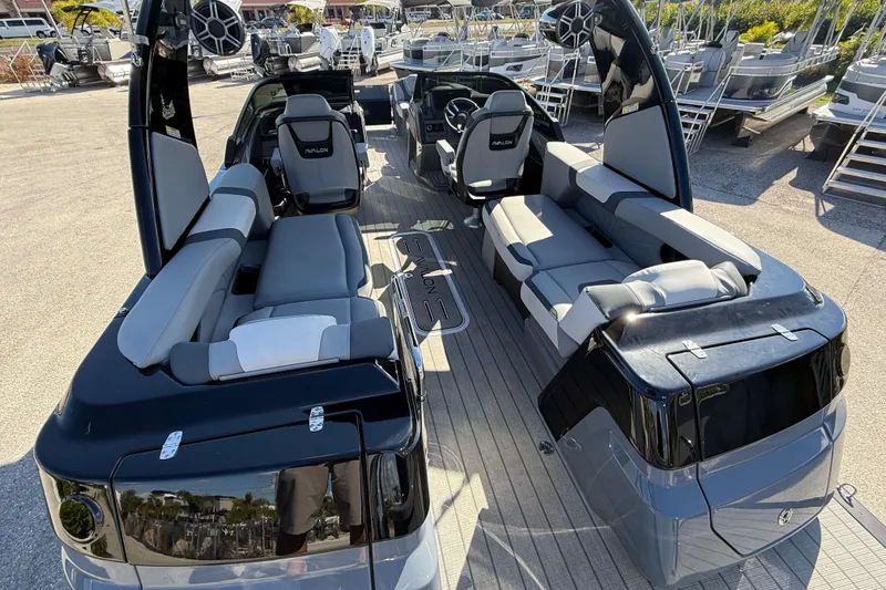 Slide: The Image of 2026 Avalon 2585 Excalibur boat with luxurious seating and high-performance features. - 12