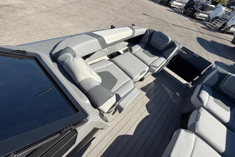 Slide: The Image of 2026 Avalon 2585 Excalibur boat interior with luxurious gray seating and spacious layout. - 15