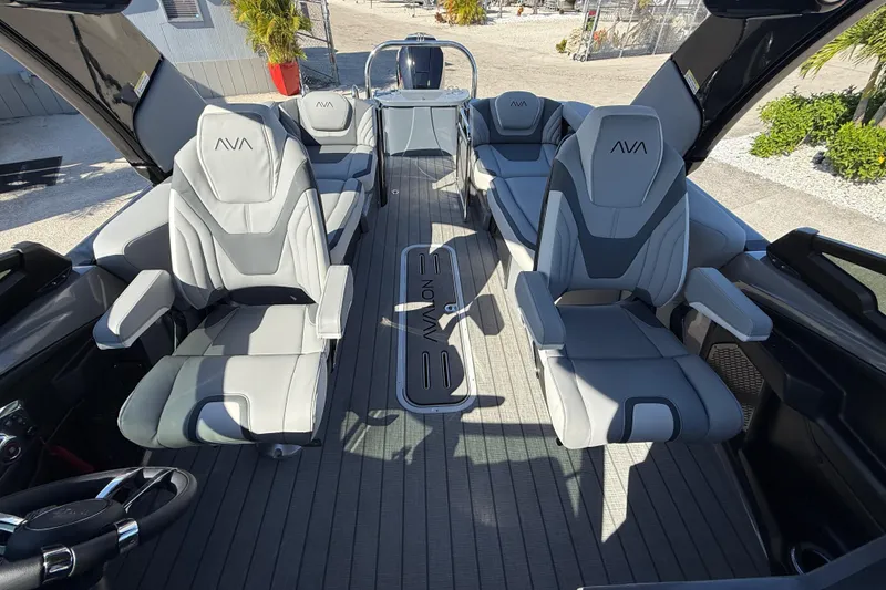 Slide: The Image of Luxurious interior of 2026 Avalon 2585 Excalibur boat with plush seating and modern design. - 19