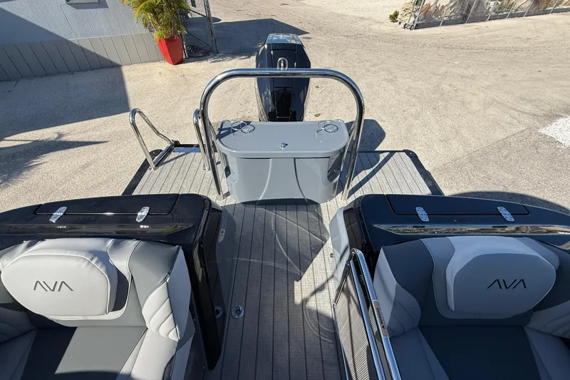 Slide: The Image of 2026 Avalon 2585 Excalibur boat interior with quad lounger seating and modern design. - 22