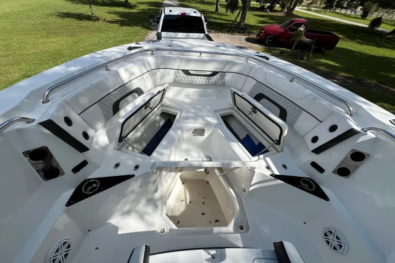 Slide: The Image of 2023 Blackfin 272 boat interior with open storage compartments, sleek design, and modern features. - 20