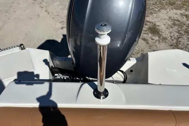 Slide: The Image of 2016 NauticStar 223 DC boat with outboard motor and stainless steel ski tow bar. - 29