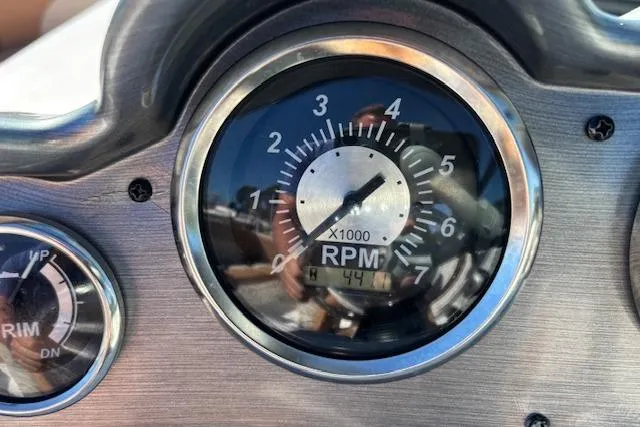 Slide: The Image of Close-up of a 2016 NauticStar 223 DC boat tachometer showing RPM gauge. - 31