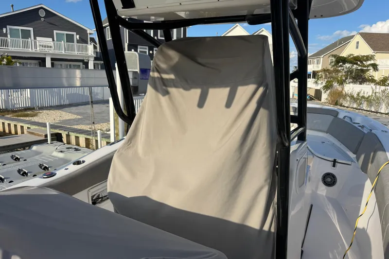 Slide: The Image of 2023 Sea Fox 268 Commander boat docked at marina during sunset. - 13