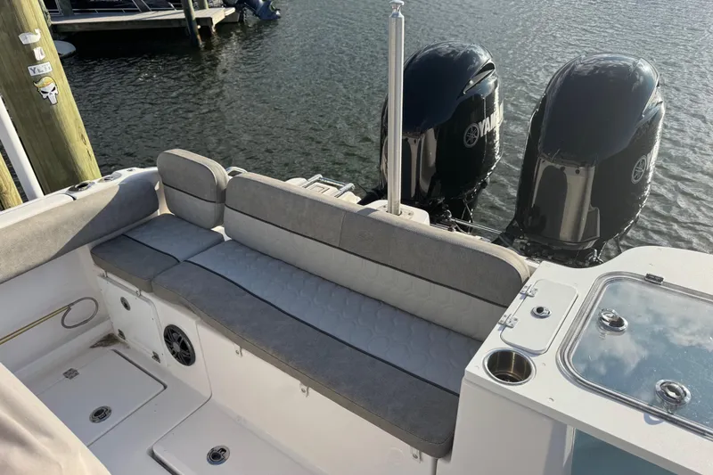Slide: The Image of 2023 Sea Fox 268 Commander boat interior with seating and RTIC cooler. - 18