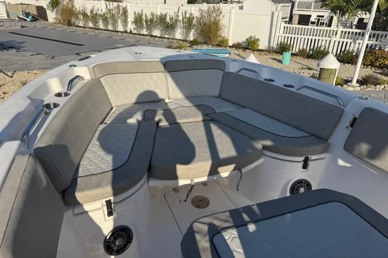 Slide: The Image of 2023 Sea Fox 268 Commander boat interior with cushioned seating and storage compartments. - 19