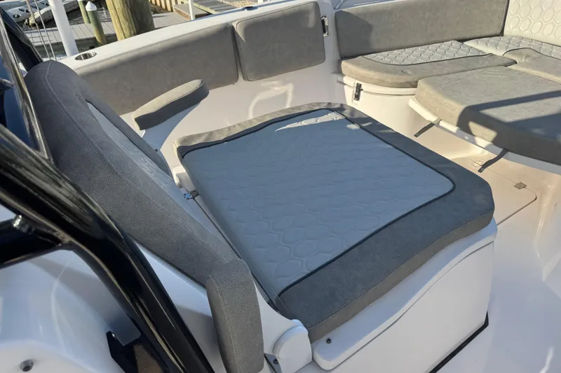 Slide: The Image of 2023 Sea Fox 268 Commander boat interior with covered seating and Yamaha engines. - 21