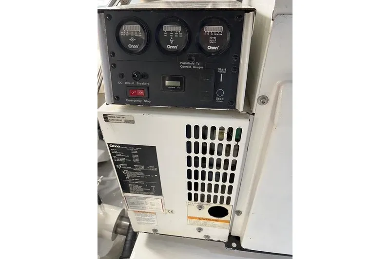 Slide: The Image of Control panel of a 2006 Norseman 480S generator with gauges and switches. - 106