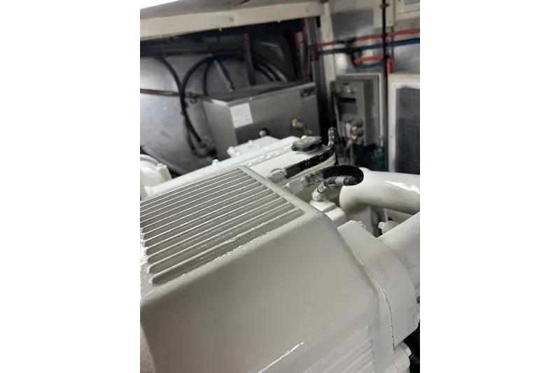 Slide: The Image of Engine room of 2006 Norseman 480S yacht, showcasing mechanical components and wiring. - 108