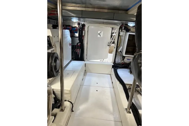 Slide: The Image of Engine room of 2006 Norseman 480S boat, featuring clean layout and equipment. - 109