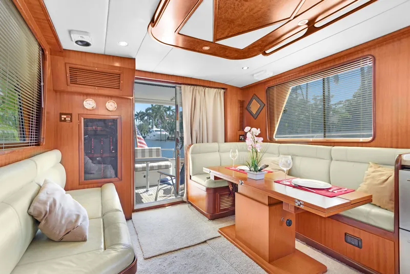 Slide: The Image of Luxurious interior of 2006 Noresman 480 Sedan yacht with elegant wood finishes. - 13