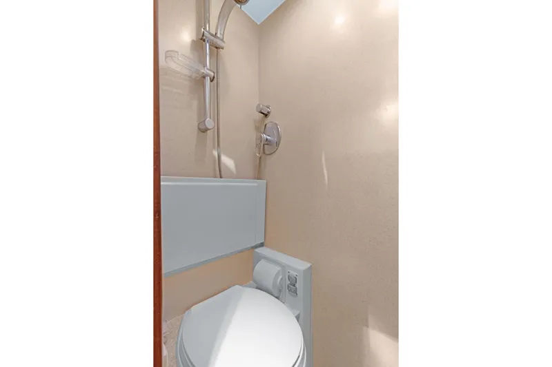 Slide: The Image of Compact bathroom in 2006 Noresman 480 Sedan with shower and toilet. - 26